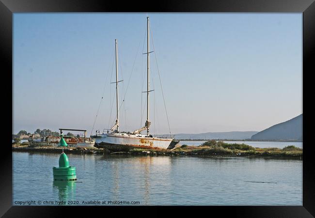 Wrecked Yacht Aground in Lefkas Framed Print by chris hyde