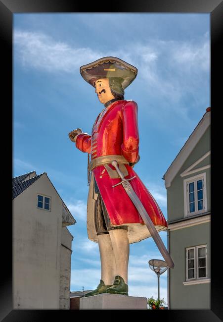 A soldier like whipping post  in the center of the danish town T Framed Print by Stig Alenäs