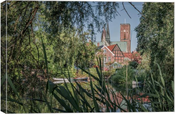a view of the cathedral of Ribe among the reeds Canvas Print by Stig Alenäs