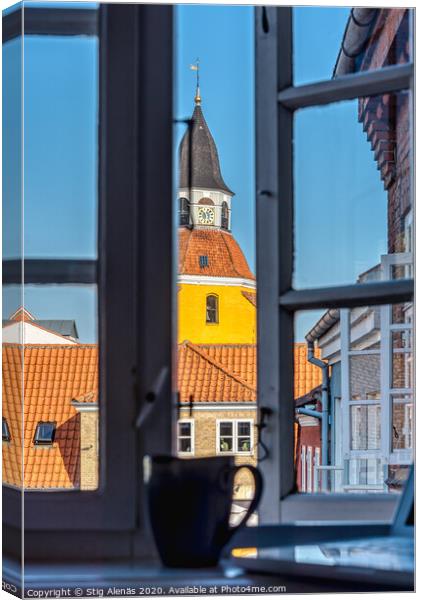 a coffee mug and a laptop in the window frame and a yellow tower Canvas Print by Stig Alenäs