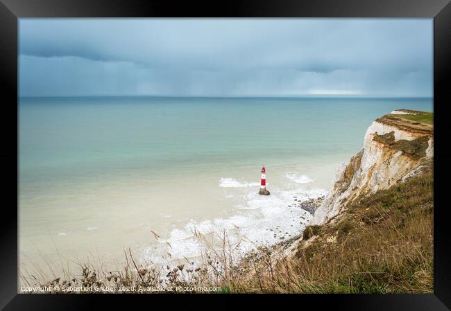 Beachy Head Lighthouse Rain Clouds Framed Print by Sebastien Greber