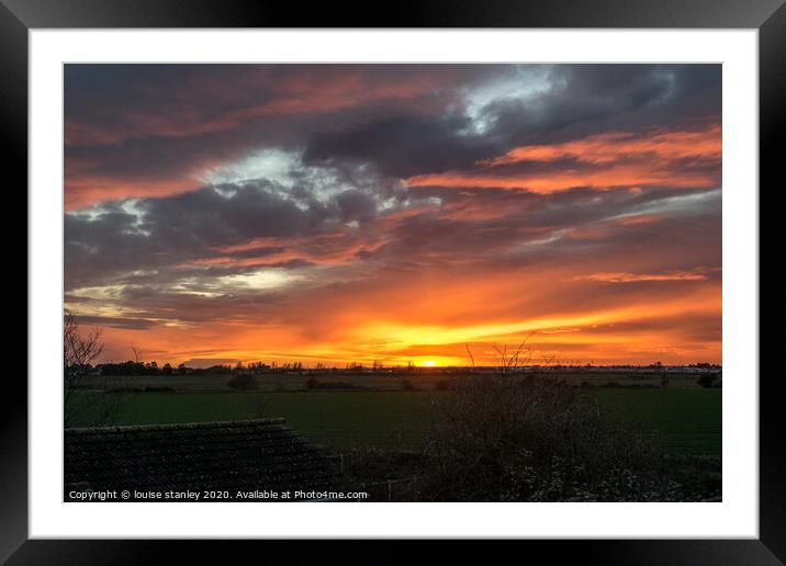 Fiery winter Sunset  Framed Mounted Print by louise stanley