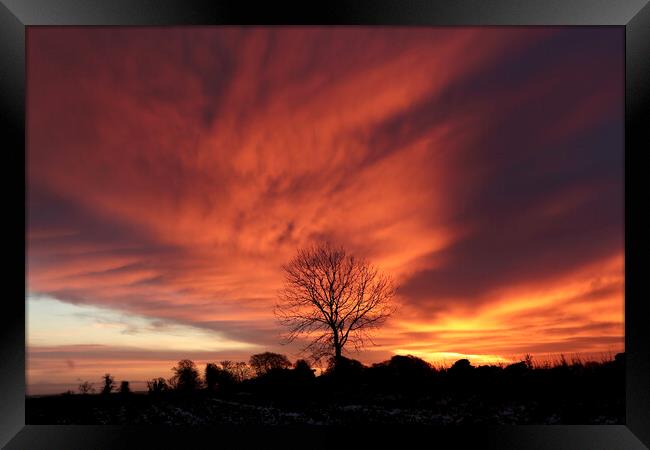 Dramatic  Cotswold sunrise Framed Print by Simon Johnson