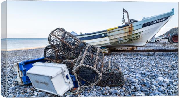 Fishing boat with its crab and lobser pots on the shore Canvas Print by Jason Wells