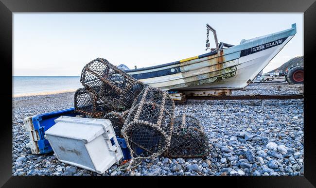 Fishing boat with its crab and lobser pots on the shore Framed Print by Jason Wells
