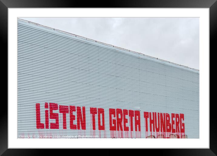 Listen to Greta Thunberg, a text message on a wall Framed Mounted Print by Stig Alenäs