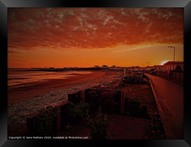 Sunset in Porthcawl Framed Print by Jane Metters