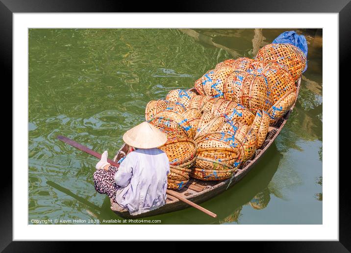 Boat loaded with baskets Framed Mounted Print by Kevin Hellon