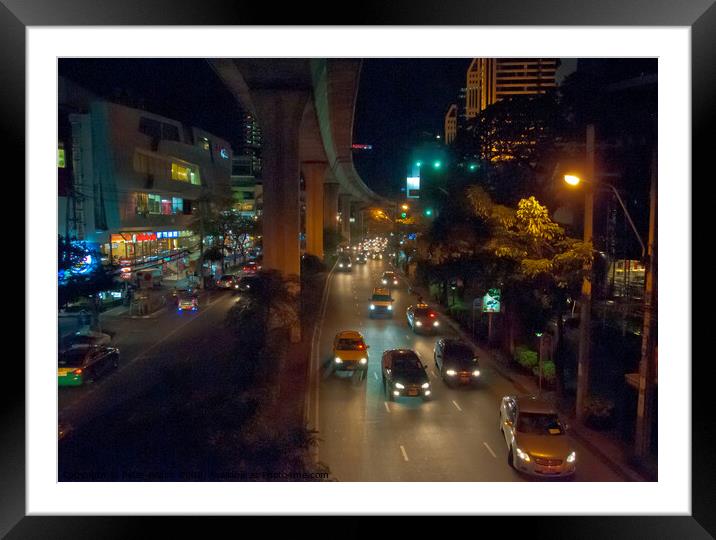 Night view in central Bangkok Framed Mounted Print by Peter Bolton