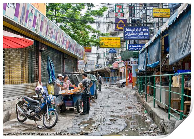 A side street in central Bangkok, Thailand, after heavy rain. Print by Peter Bolton