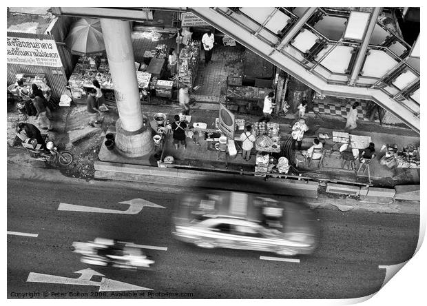 Black and white view from overhead of a street with food vendors and traffic. Bangkok, Thailand. Print by Peter Bolton