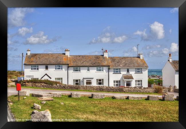 Coastguard Cottages Framed Print by Nicola Clark