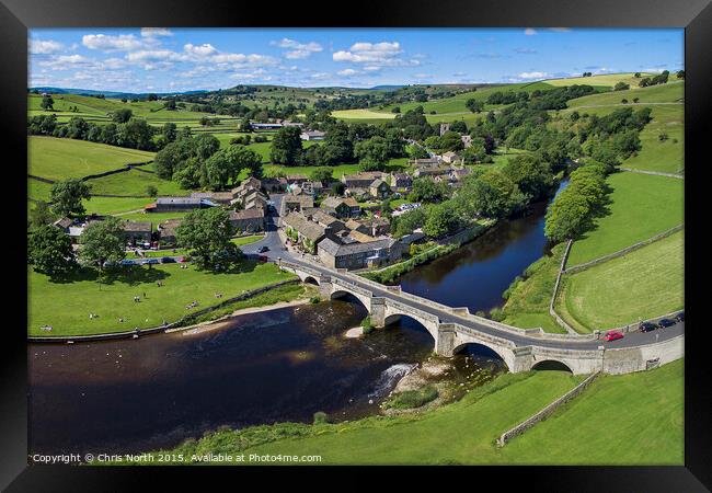 Burnsall Village and the river Wharfe. Framed Print by Chris North