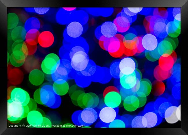 Blurred Colourful Christmas Lights Framed Print by Geoff Smith