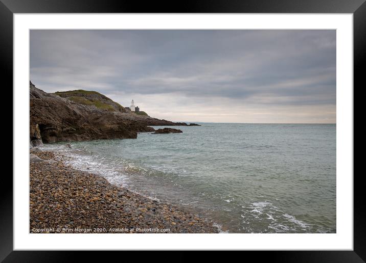 Mumbles lighthouse viewed from Bracelet bay Framed Mounted Print by Bryn Morgan