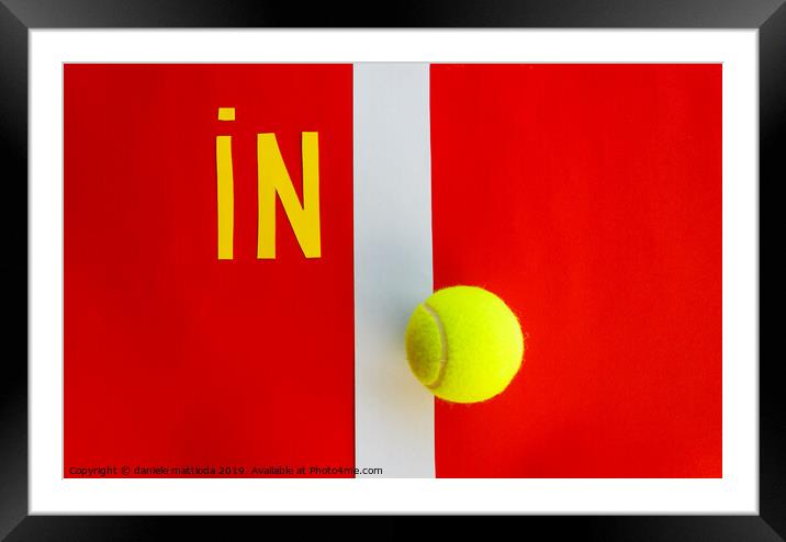 the written  in  next to a line of a tennis court  Framed Mounted Print by daniele mattioda