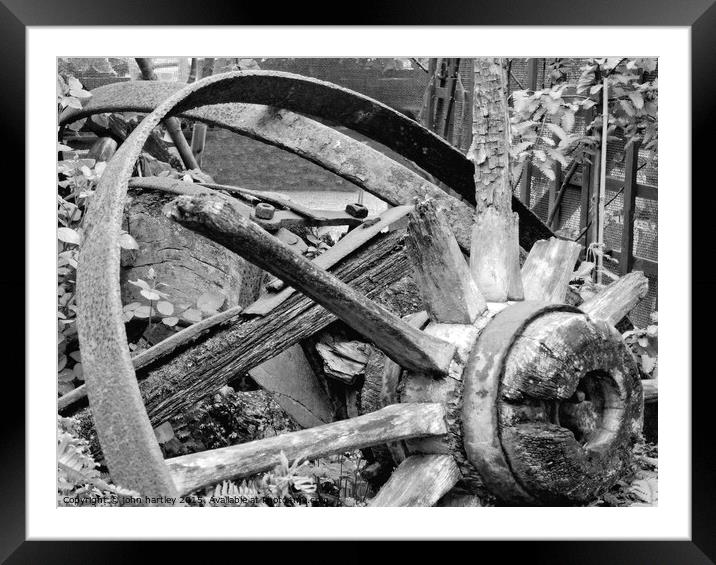The Hub-Broken wooden cart wheel in Mono Framed Mounted Print by john hartley