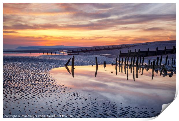 Sunset reflections at low tide Print by Paul Praeger