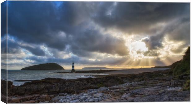 Sun Rays Over Penmon Lighthouse And Puffin Island Canvas Print by Phil Durkin DPAGB BPE4