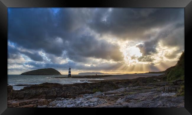 Sun Rays Over Penmon Lighthouse And Puffin Island Framed Print by Phil Durkin DPAGB BPE4
