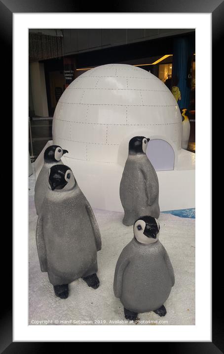 group of Penguin sculptures in front of an igloo 1 Framed Mounted Print by Hanif Setiawan