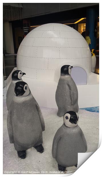 group of Penguin sculptures in front of an igloo 1 Print by Hanif Setiawan