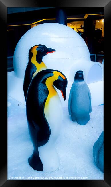 group of Penguin sculptures in front of an igloo 4 Framed Print by Hanif Setiawan
