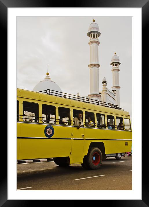 bus and mosque Framed Mounted Print by Hassan Najmy