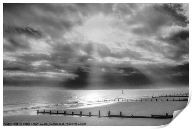 Sun rays streaming through clouds at Frinton beach Print by Paula Tracy