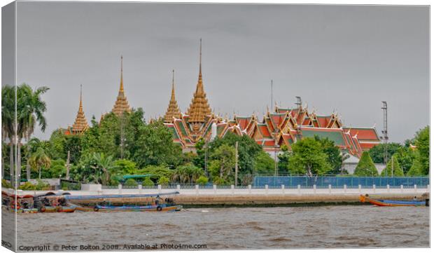 View of The Grand Palace from the Chao Phraya River, Bangkok, Thailand. Canvas Print by Peter Bolton