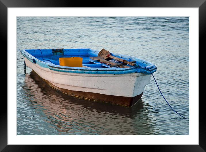 boat resting Framed Mounted Print by Hassan Najmy