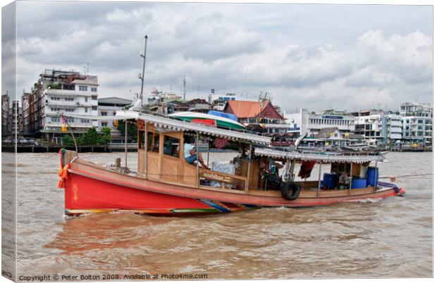 A tourist excursion boat on the Chao Phraya river, Bangkok, Thailand. Canvas Print by Peter Bolton