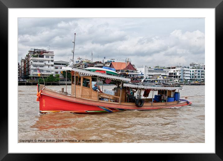A tourist excursion boat on the Chao Phraya river, Bangkok, Thailand. Framed Mounted Print by Peter Bolton