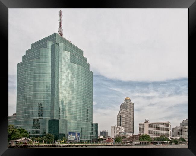 Glass and steel office building in Bangkok, Thailand. Framed Print by Peter Bolton