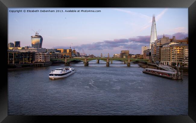 London skyline from Milennium Bridge. Framed Print by Elizabeth Debenham