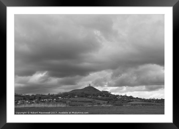 Storm clouds gather over Glastonbury Tor Framed Mounted Print by Robert MacDowall