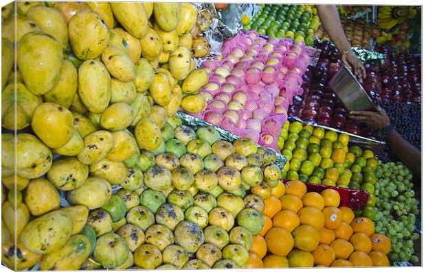 fruits selling Canvas Print by Hassan Najmy