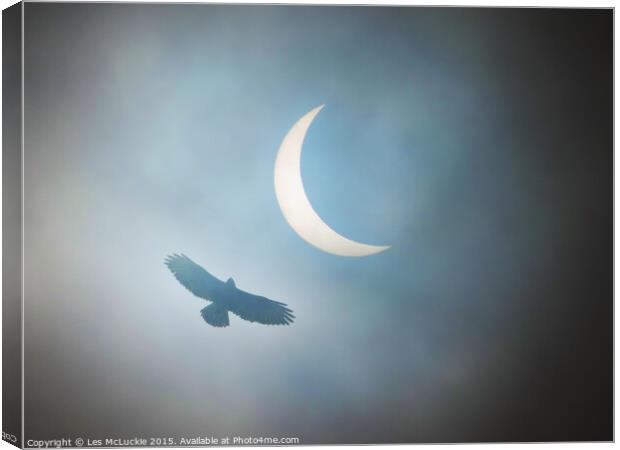 Majestic Buzzard Soaring through the Eclipse Canvas Print by Les McLuckie
