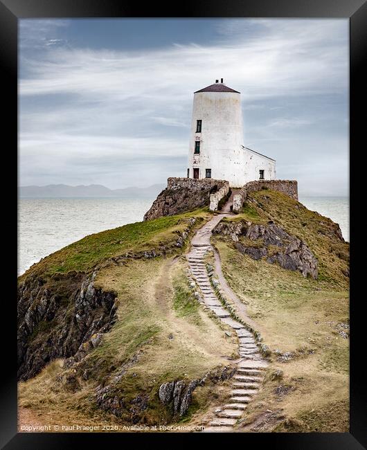 Lighthouse and path Anglesey Framed Print by Paul Praeger