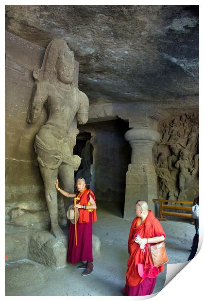 Mumbai, India - October 23, 2018: Interior of a Hindu God sculpture of Elephanta cave, late Gupta dating from between the 9th and 11th centuries, UNESCO World Heritage Site and buddhist monk tourist Print by Arpan Bhatia