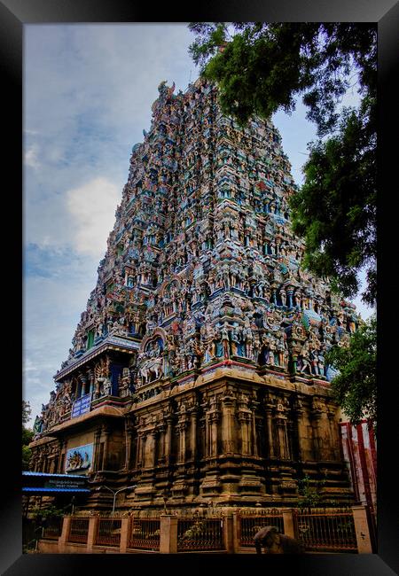 Madurai, South India - November 02, 2018: One of the hindu religious temple amongst many in Meenakshi temple against blue sky Framed Print by Arpan Bhatia