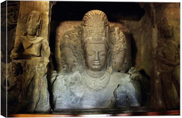 Mumbai, India - October 23, 2018: Interior of a Trimurti sculpture of Elephanta cave, late Gupta dating from between the 9th and 11th centuries, UNESCO World Heritage Site Canvas Print by Arpan Bhatia