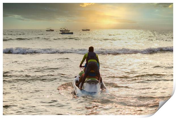 Goa, India - October 25, 2018: A jet ski moving swiftly against waves towards sunset in an arabian sea. Water sports adventure in Goa Print by Arpan Bhatia