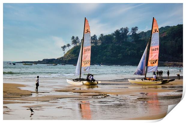 Goa, India - October 25, 2018: Sailing boat kept on a seashore beach with it's reflection on water during evening. Commercial beach of Goa. Print by Arpan Bhatia