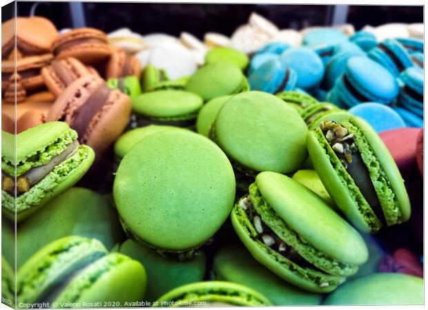 many colorful macarons biscuits arranged disorderly Canvas Print by Valerio Rosati