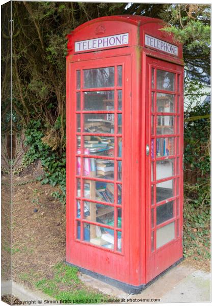 Red telephone box as a mobile library Canvas Print by Simon Bratt LRPS