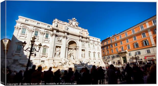 The marble facade of the Trevi Fountain illuminated by the sun Canvas Print by Valerio Rosati