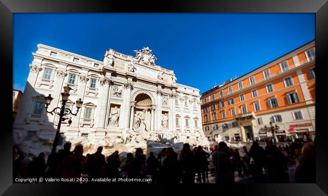 The marble facade of the Trevi Fountain illuminated by the sun Framed Print by Valerio Rosati