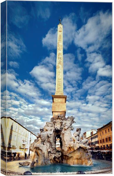 the fountain of the four rivers designed by Bernini in the center of Piazza Navona in Rome Canvas Print by Valerio Rosati