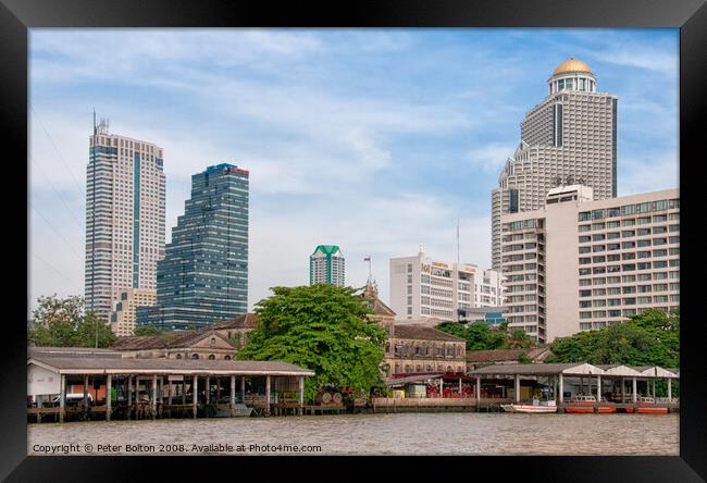 Apartment towers including 'State Tower' (right) in Bangkok, Thailand. Framed Print by Peter Bolton